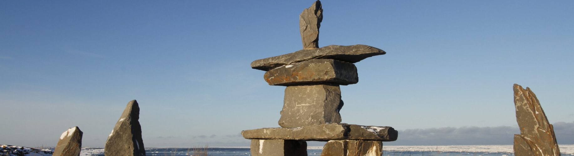 Set of rocks and a inuksuk and inukshuk found in early November near Churchill, Manitoba